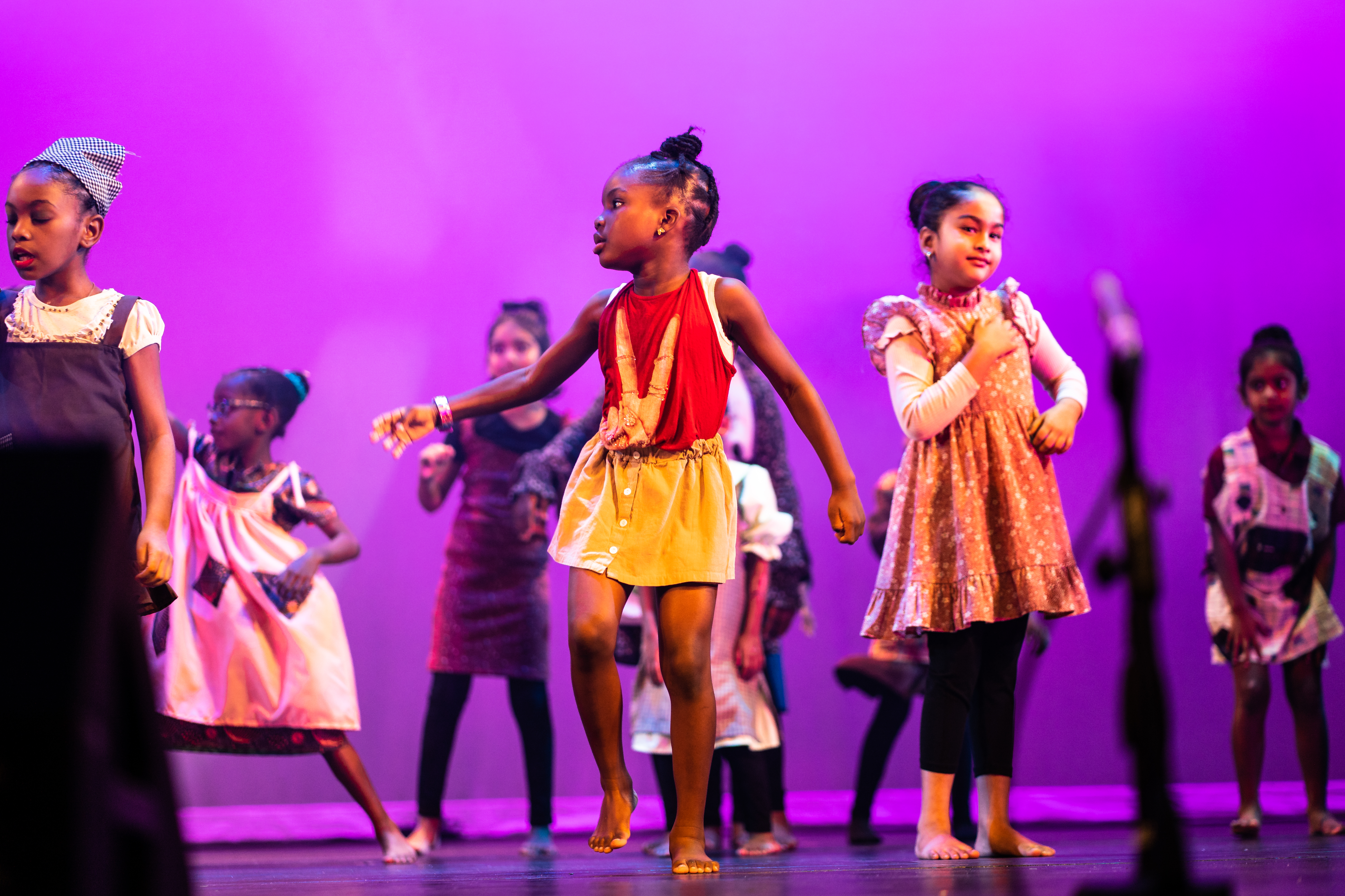 Young Laudem dancers performing on stage